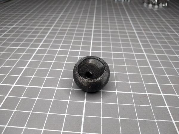 A 3D-printed, print-in-place ball joint.