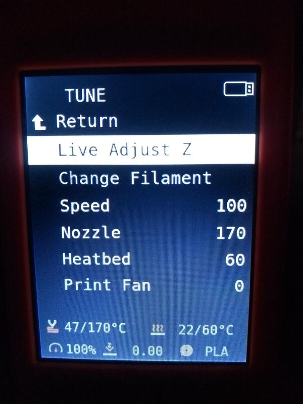 A screenshot of the Prusa Mini Firmware. In the Tune menu during an ongoing print, Live Adjust Z is selected.