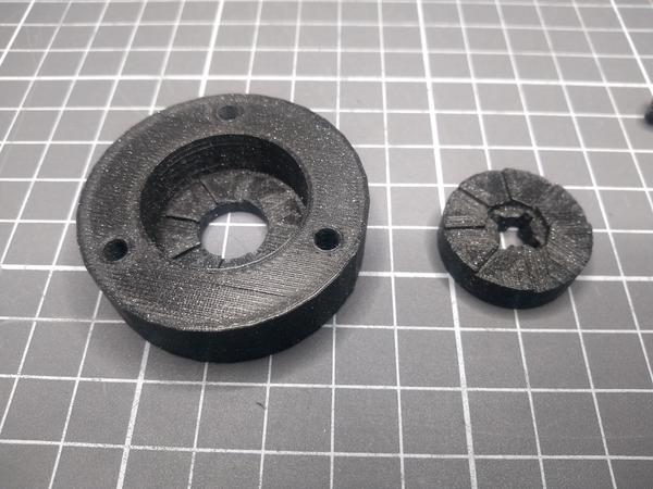 The rotor on the left, the nut on the right. The matching steps can be seen.