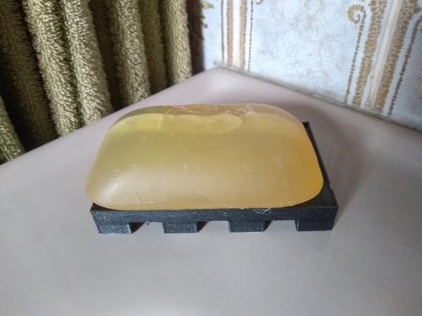 A 3D-printed soap dish, with soap on it.