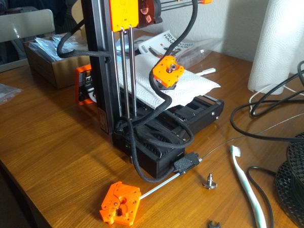 A Prusa Mini with a disassembled extruder.