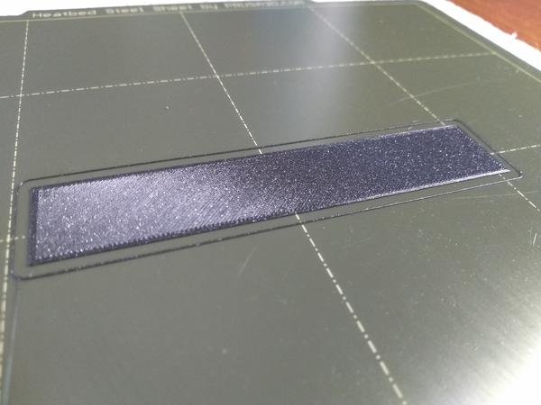 A single-layer calibration print that shows no issues.