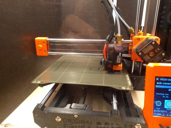 A new back cover has just started printing on the Prusa Mini.