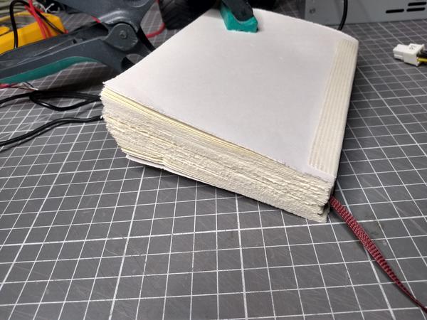 Notebook #6, without a cover, one side finished.